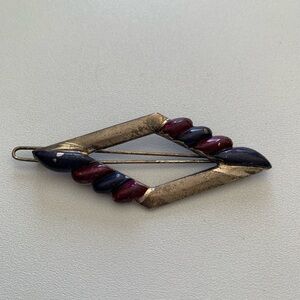 Antique barrette with enamel detailing. May be sterling.